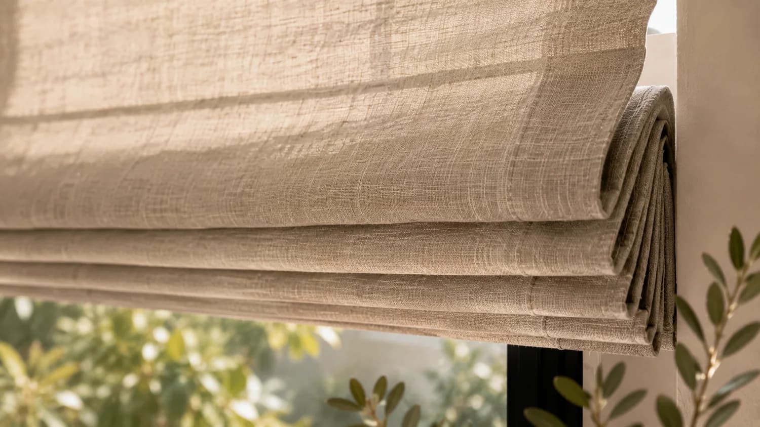 Close-up of a lowered Roman shade fabric panel.