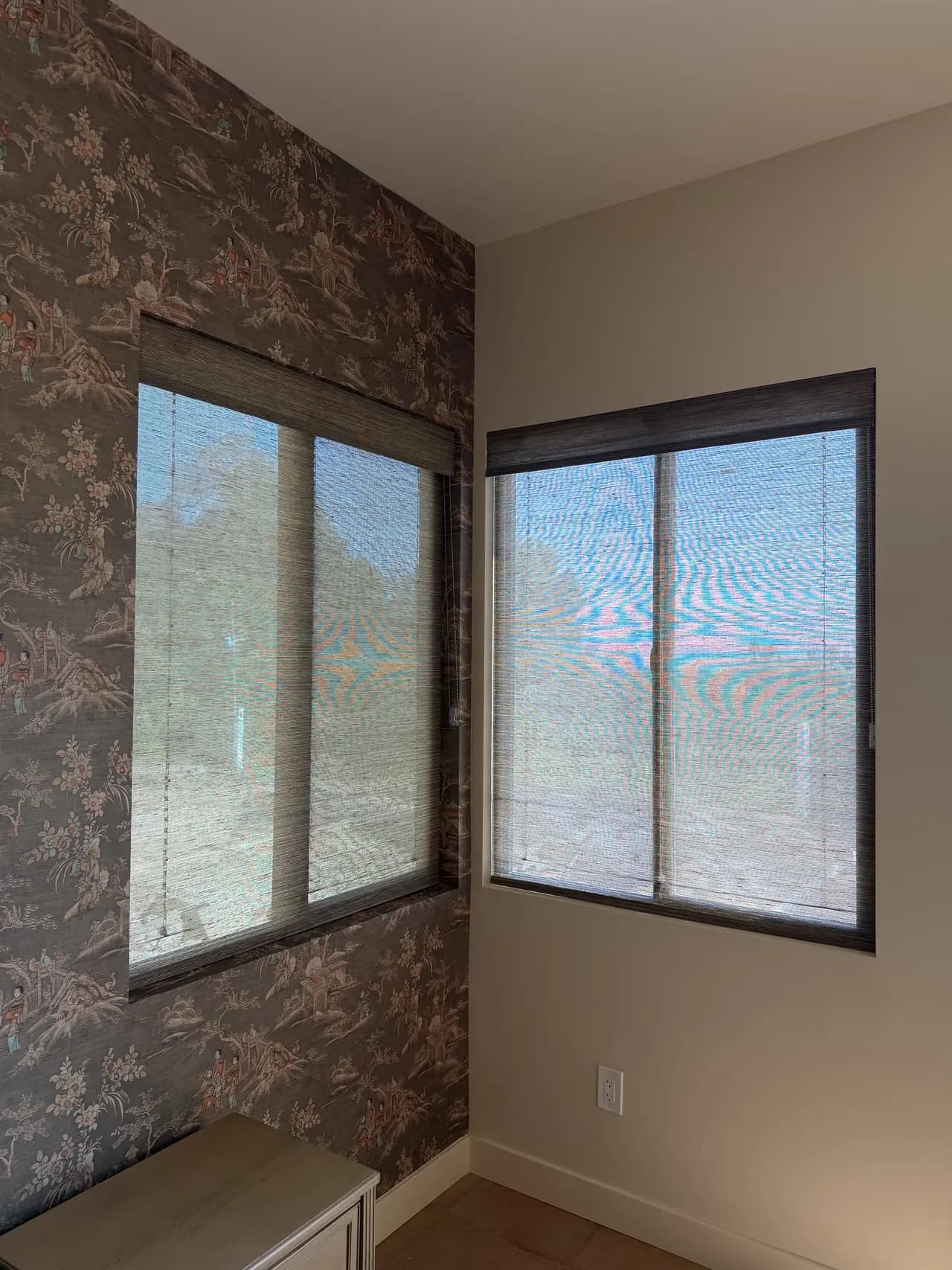 Woven wood shades shown from another angle on adjacent windows in a Newport Beach home
